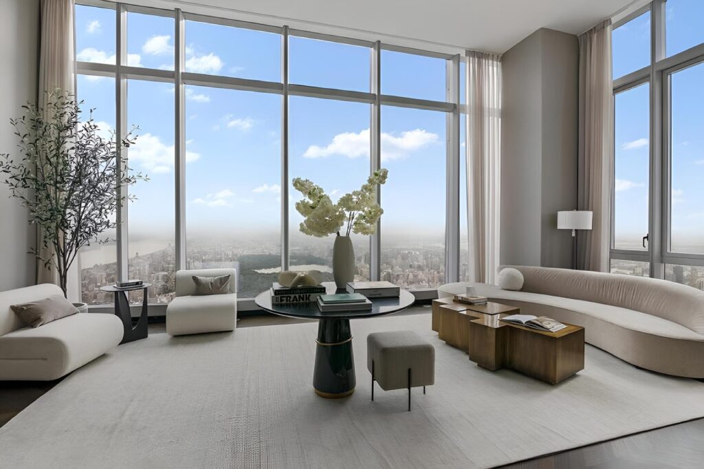 Luxury high-rise condo living room with floor-to-ceiling windows and city views